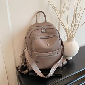 Stylish women's casual leather backpack, large capacity travel daypack for daily commute.