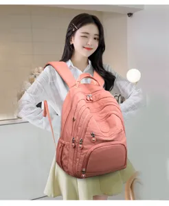 Pink casual multi-pocket backpack for women and students, perfect for daily school and travel.