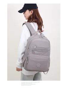 Zaino casual in nylon multi-tasche per donne e studenti, leggero e molto spazioso.