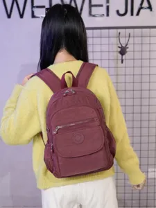 Casual nylon backpack for women lightweight school travel daypack with multiple compartments