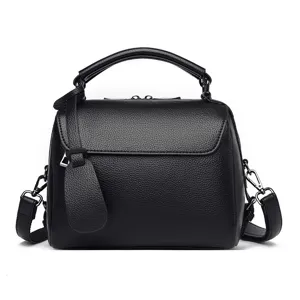 Classic black leather women handbag, stylish top handle shoulder crossbody bag for daily use.