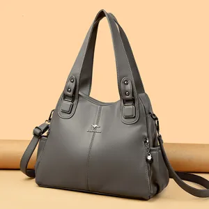 Elegant grey leather tote bag for women, large capacity shoulder bag with dual handles.