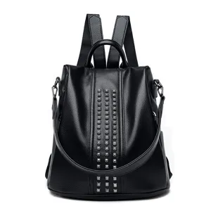 Stylish black women anti-theft backpack with chic studded details, perfect for travel and daily use.