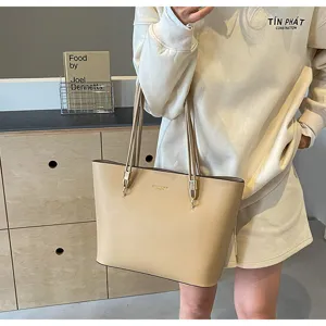 Minimalist large capacity PU leather tote bag, versatile casual shoulder bag for women daily commute.