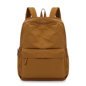 Casual waterproof nylon backpack for travel and school, large capacity solid color school bag.