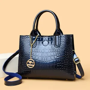 Blue patent leather crocodile pattern handbag tote bag with shoulder strap and metal pendant