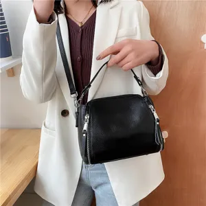 Genuine leather shoulder bag for women, stylish casual crossbody bag with side zippers for daily use.