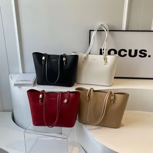 Minimalist large capacity PU leather tote bag, versatile shoulder bag for women daily commute.
