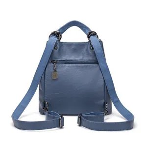 Zaino in pelle blu classico da donna con spallacci in tessuto, elegante e capiente borsa.