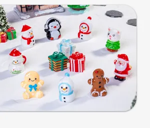 Mini resin Christmas figurines set featuring Santa and snowmen for desktop decor detail.