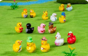 Detailed close-up of colorful resin mini duck figurines displayed on green turf for decor.