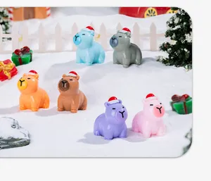 Cute Christmas hat capybara resin figurines detail view, perfect for desktop decoration crafts.