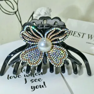 Grande molletta per capelli con strass e perla design farfalla nera stile donna elegante dettaglio