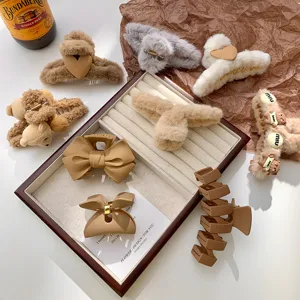 Set of stylish plush hair claws, cute furry winter hair clips, brown hair accessories for women.