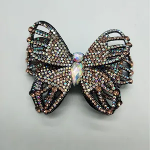 Sparkling rhinestone butterfly hair clip accessory, colorful crystal patch for garments.
