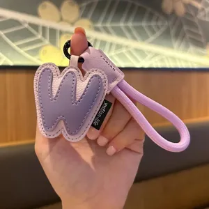 Letter W leather keychain bag charm, cute pastel dopamine aesthetic accessory for women.