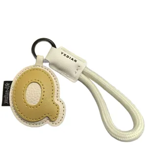 Cute leather letter Q keychain bag charm with woven wrist strap accessory for women girls