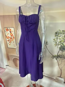 Purple strappy midi dress with ruched bust and tie front, elegant and stylish for summer.
