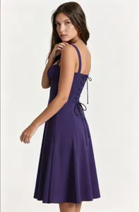 Detailed view of the elegant purple midi dress with laced back and sweetheart neckline.