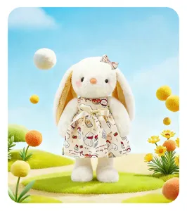 Closeup detail of cute white plush rabbit doll wearing printed dress with sweet bow decor.