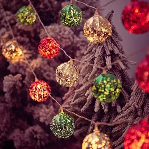 LED Christmas string lights with colorful decorative glass globes for holiday decor.