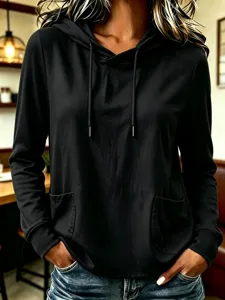 Women's casual solid color long sleeve hooded sweatshirt with front pockets and drawstrings.
