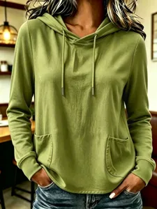 Women solid color long sleeve hooded sweatshirt with casual drawstring and front pockets detail.