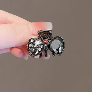 Black crystal bow hair claw clip, mini metallic rhinestone hair clip for women and girls style.