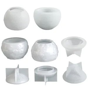 Silicone mold for DIY candle holder and storage jar with embossed snowflake and berry design.