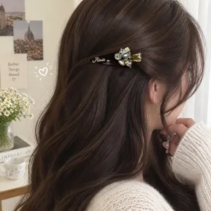Chic rhinestone triangle hair clip for women, elegant side hairpin, vintage sparkly accessory.
