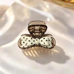 Korean style brown transparent hair claw clip featuring a chic white polka dot bow detail.