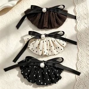 Retro sweet bow hair clip for women, elegant polka dot pleated hair barrette with pearl decor.