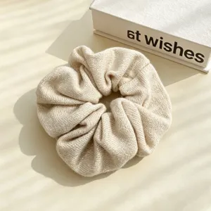 Minimalist sparkly knit hair scrunchie for daily commuting, chic low ponytail hair accessory.