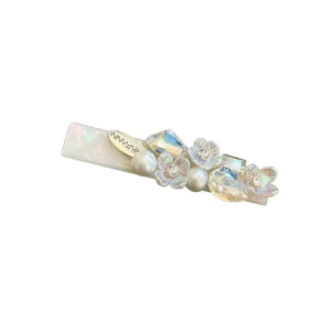 French light luxury pearl flower hair clip, sweet rhinestone duckbill clip for women.