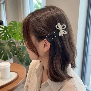 Chic pinza para el cabello BB de terciopelo negro con lunares y lazo de diamantes de imitación.