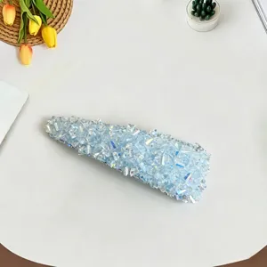 Sparkling blue crystal rhinestone hair clip detail, elegant hair accessory for women and girls.