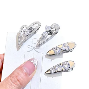 Fashion zircon heart bow hair clips for women, silver duckbill clips, elegant crystal bang clips.