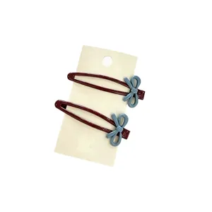 Cute 2-pack bow hair clips for women, stylish contrast color metal BB clips for bangs and daily.