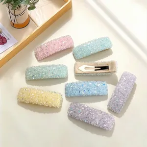 Detailed view of trendy Korean sparkling crystal hair clips, colorful glitter side bb hair pins.
