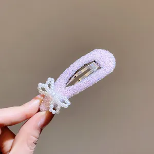 Leuke parel strik strass BB haarspeld voor vrouwen, stijlvolle paarse haaraccessoire.
