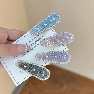 Close up detail of sparkling crystal rhinestone hair clips set, gorgeous hair accessories for girls.