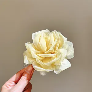 Sweet organza camellia flower hair comb with pearl detail, elegant hair accessory for women.