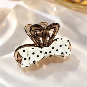 Korean chic polka dot bow hair claw clip, elegant translucent brown shark clip for daily hair styling.
