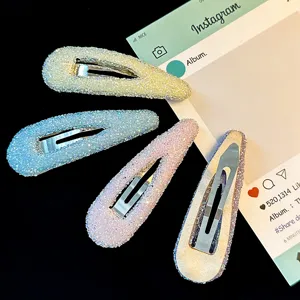 Colorful rhinestone teardrop hair clips set, sparkling snap side hair pins for women styling.