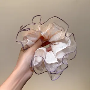 Korean style sheer mesh hair scrunchie with glitter trim, elegant and fluffy hair accessory.