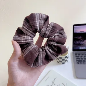 Brown plaid hair scrunchie, retro aesthetic fabric hair tie for daily hairstyles and ponytails.