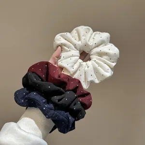 Korean fabric polka dot hair scrunchie, elegant pleated design, high elasticity hair rope.