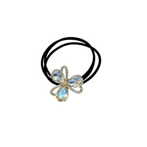 Crystal flower hair tie with sparkling rhinestones, elegant elastic ponytail holder for women.