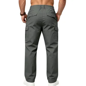 Back view detail of men grey cargo pants with multiple utility pockets and elastic waist.