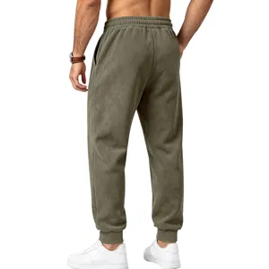 Men suede air layer brushed sweatpants elastic waist drawstring cuffed athletic pants detail.
